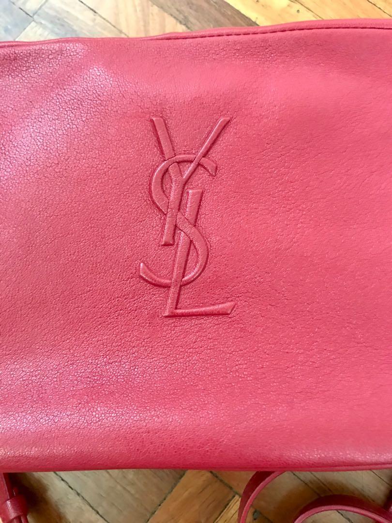 YSL camera bag (Category: Luxury Bags & Wallets) located in Paranaque City. Submitted by superpeanut (Listing ID 1051250957, Image 3). Description: YSL camera bag Authentic. Bought in Italy Red leather, silver hardware, black cloth inner lining Removable tassle Adjustable sling strap Clean inside and out Used gently With cards, dustbag BPI deposit LBC or JRS .