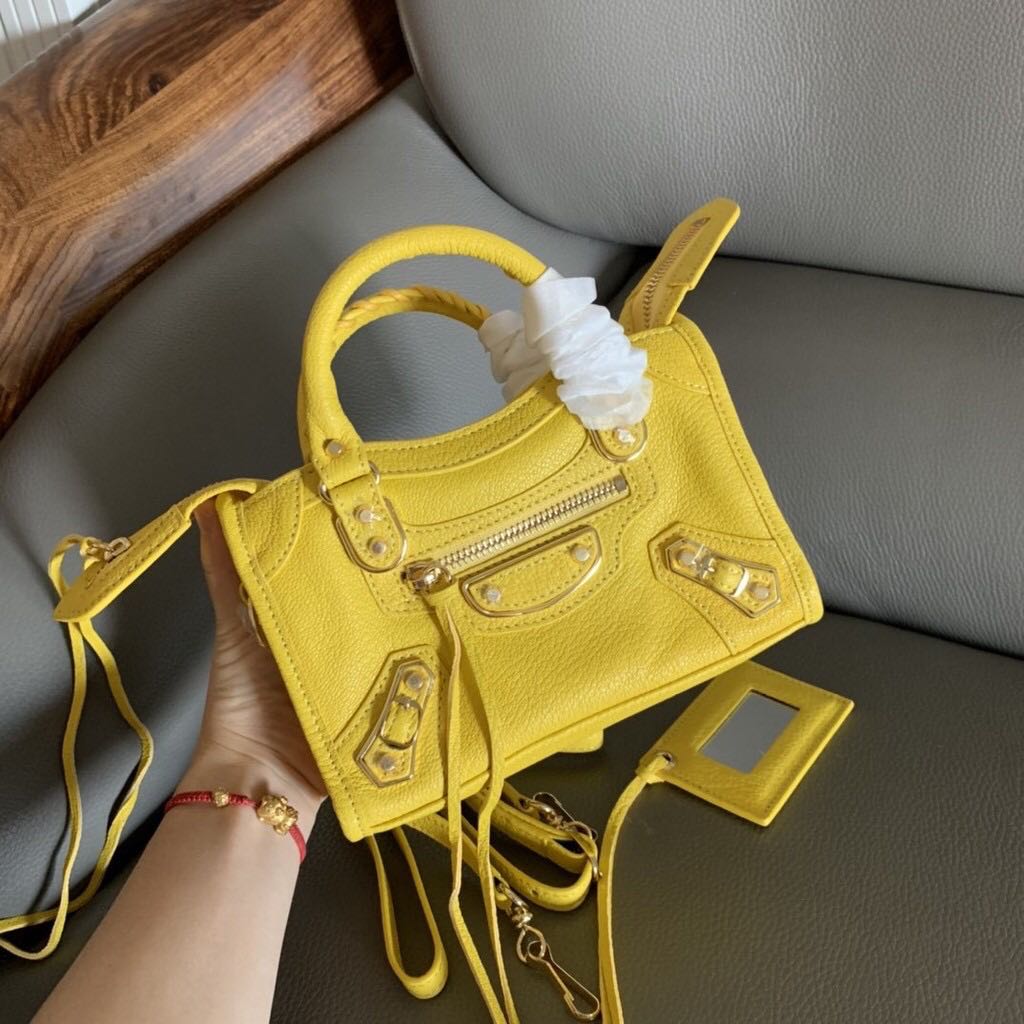 Balenciaga mini city yellow top