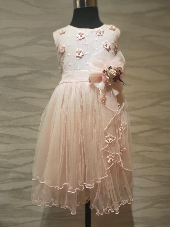White dress with best sale flowers on the bottom