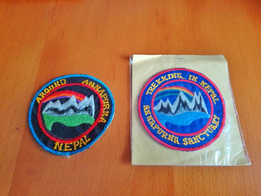 Badge patch (Category: Travel Essentials & Accessories) located in Singapore. Submitted by khome2020 (Listing ID 1051649578, Image 1). Description: Trekking badge patch bought during trekking trip in Nepal. Can be sewn on bagpack or keep as display item. $2.00 for each badge. Buy all 4 at $7. Postal delivery can be arranged..