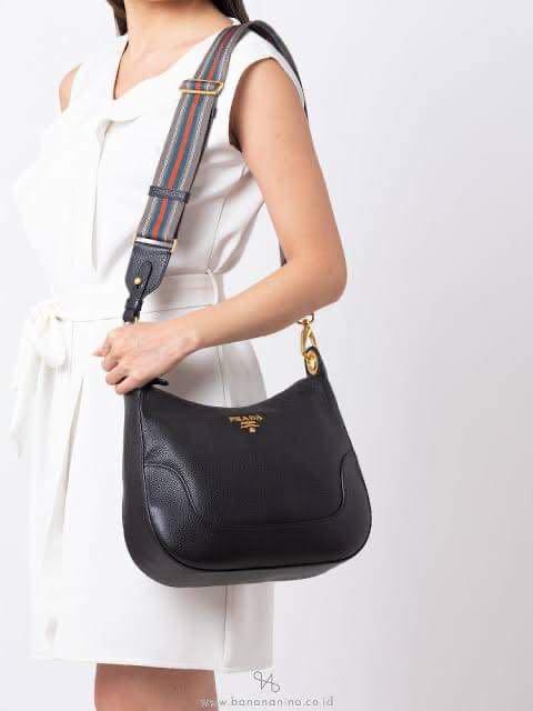 Prada Vitello Daino Black Leather Shoulder Handbag with Nylon Web Striped  Strap 1BC052, Luxury, Bags & Wallets on Carousell