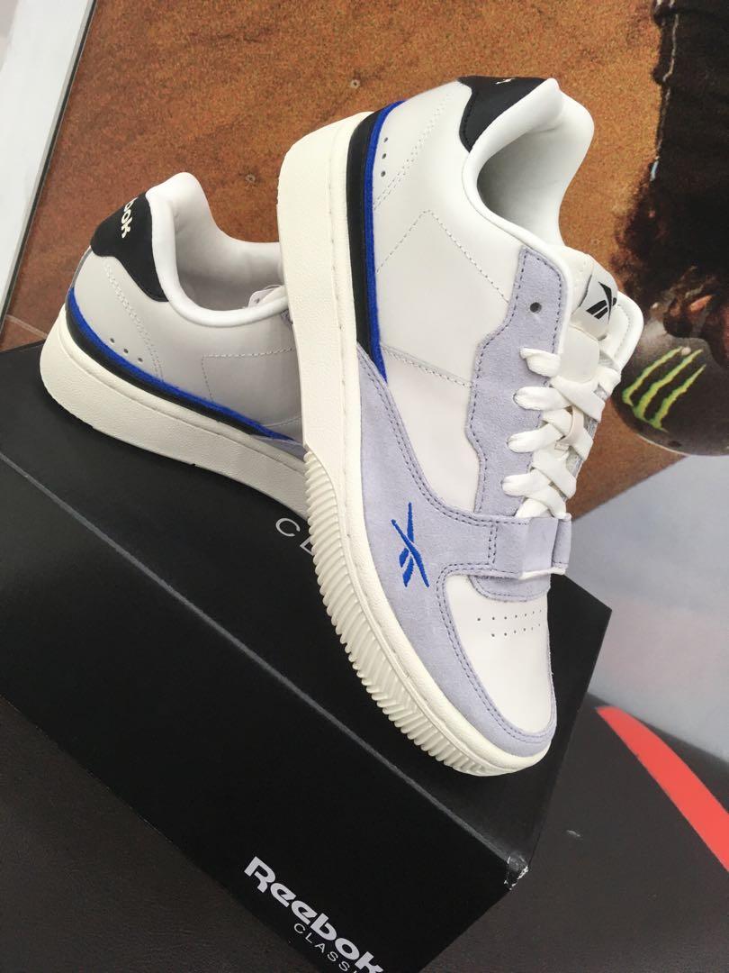 Reebok classics dual court trainers hotsell in white