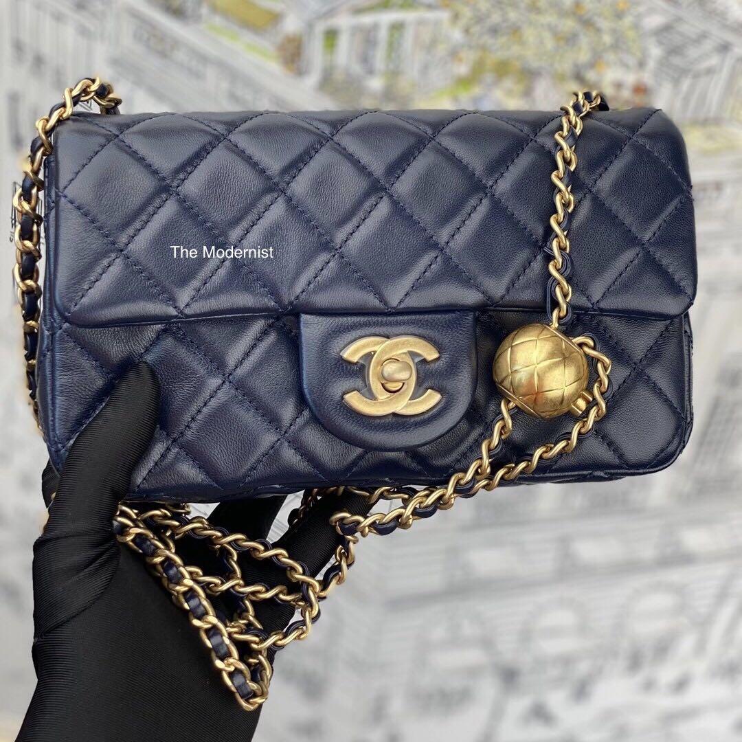 Authentic Chanel Mini Rectangular Dark Blue Lambskin Gold Pearl Crush/Gold  Ball
