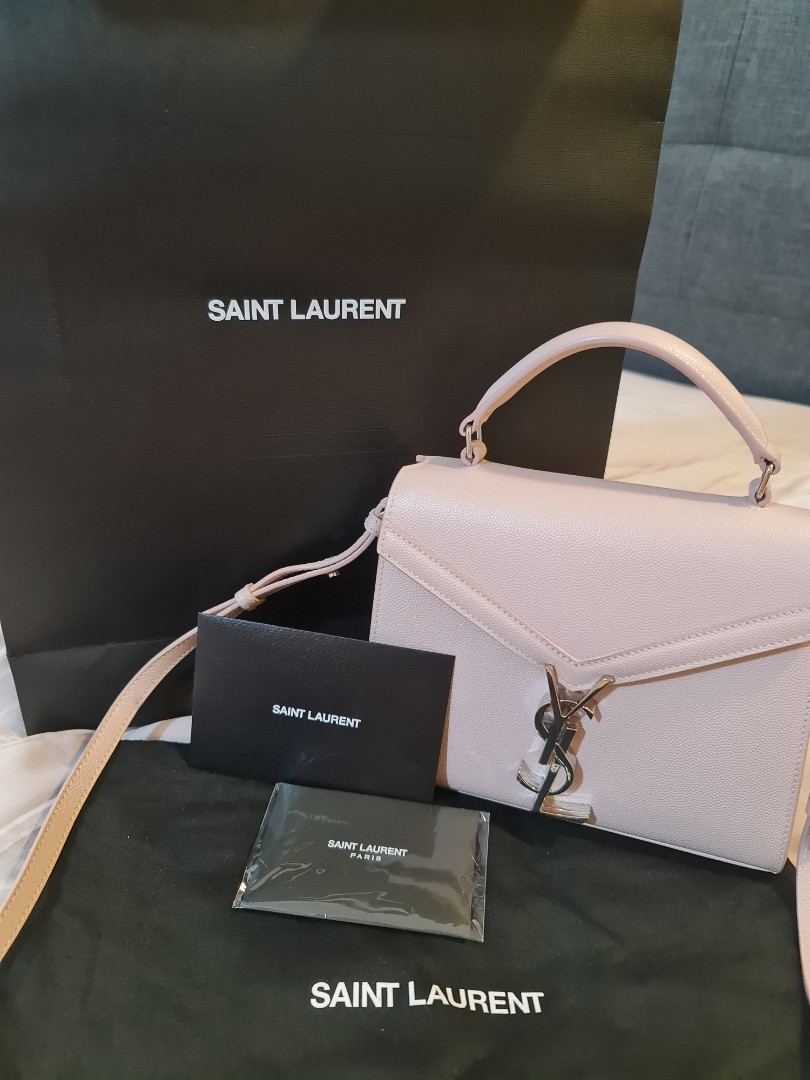 Saint Laurent Mini Cassandra Leather Top Handle Bag in Matt Gold