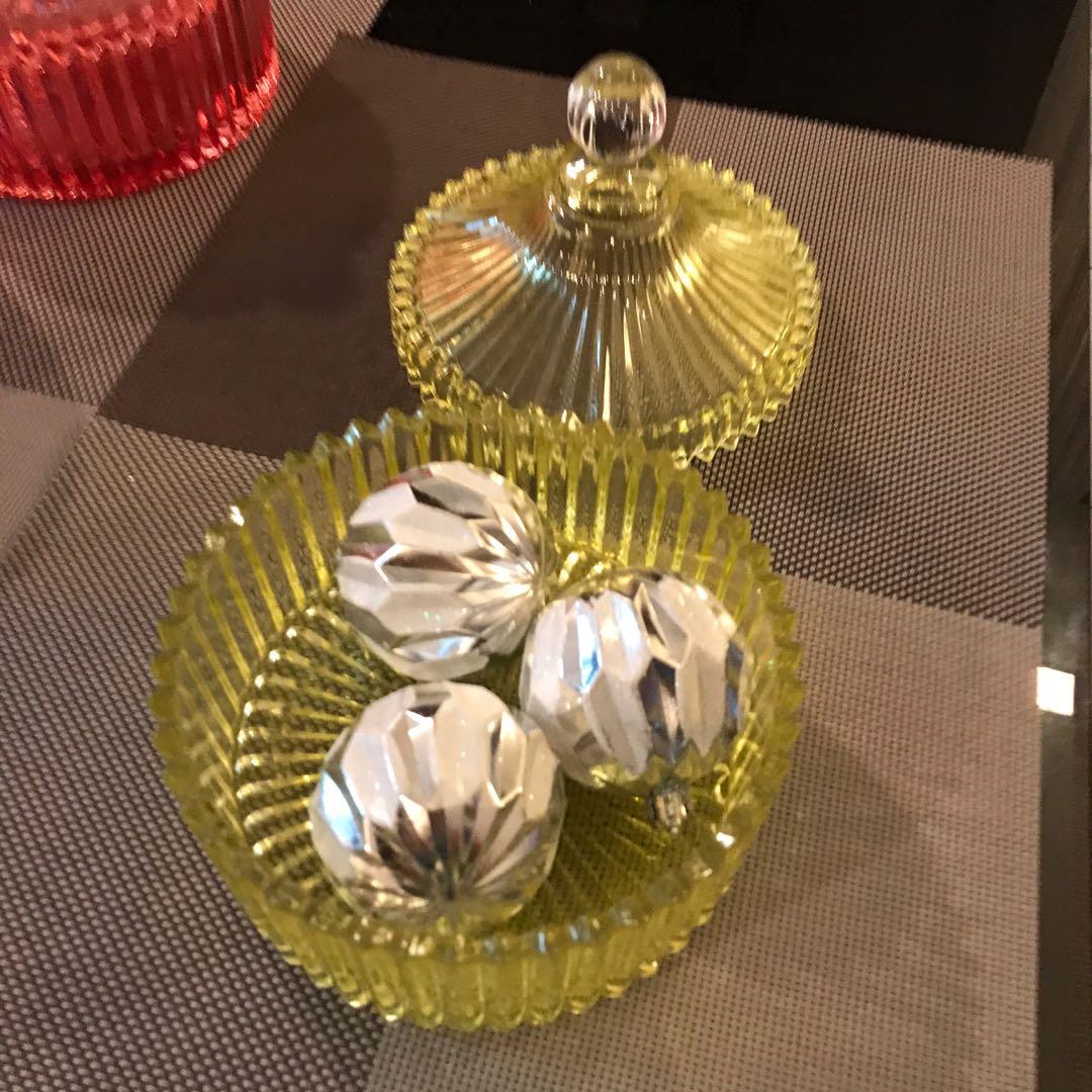 Decorative glass container (Category: Storage Boxes & Baskets) located in Antipolo. Submitted by myhikaw (Listing ID 1052183933, Image 2). Description: Yellow. Good condition For food, jewelries, accessories, decor, etc W-15 cm H-6 cm.