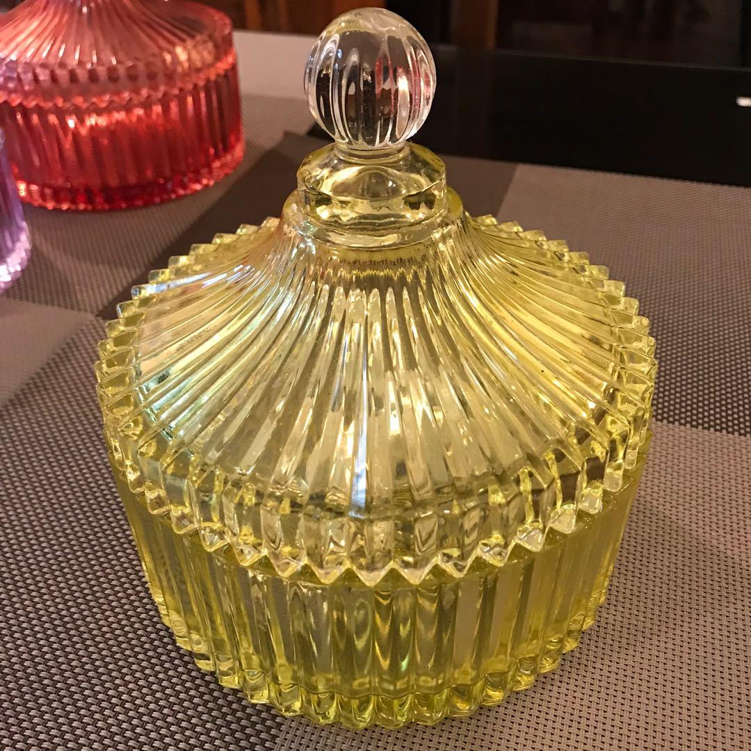 Decorative glass container (Category: Storage Boxes & Baskets) located in Antipolo. Submitted by myhikaw (Listing ID 1052183933, Image 1). Description: Yellow. Good condition For food, jewelries, accessories, decor, etc W-15 cm H-6 cm.