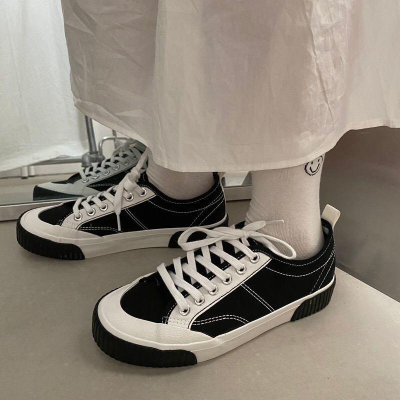 black and white canvas trainers