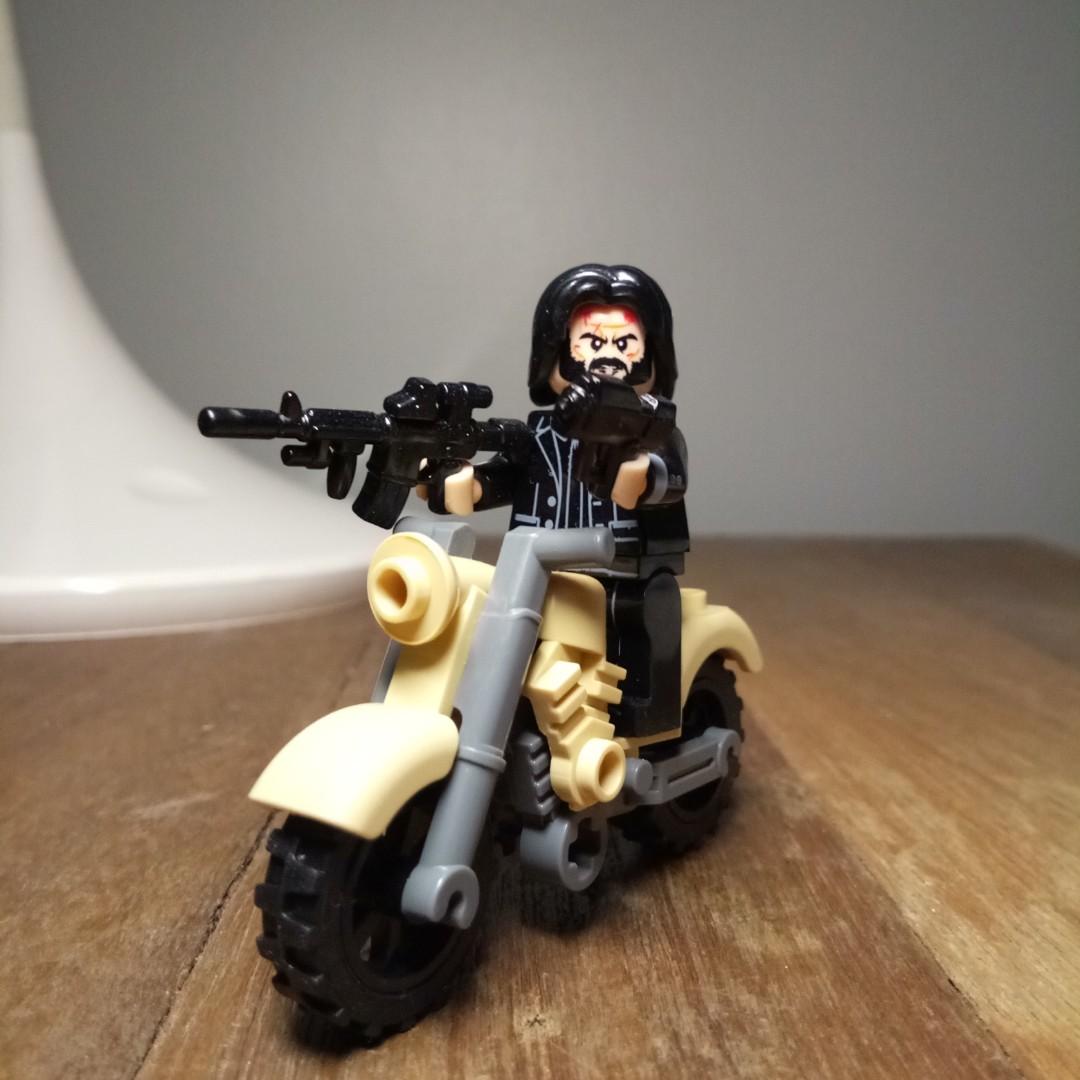 John Wick Minifigure (Category: Lego & Building Sets) located in Taguig. Submitted by garagesale_ph (Listing ID 1052471109, Image 1). Description: Motorcycle included. Not an official product..