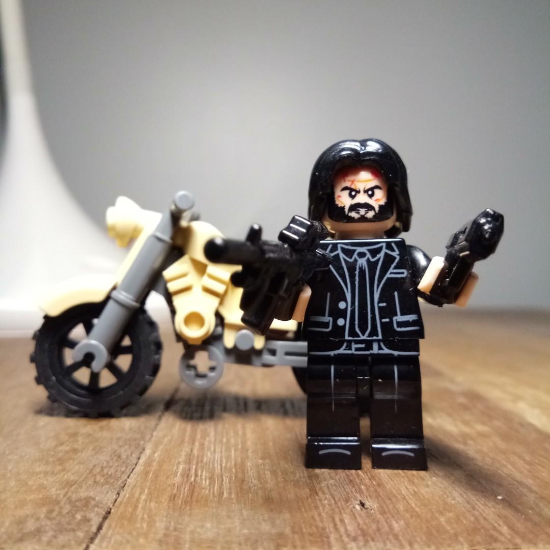 John Wick Minifigure (Category: Lego & Building Sets) located in Taguig. Submitted by garagesale_ph (Listing ID 1052471109, Image 2). Description: Motorcycle included. Not an official product..