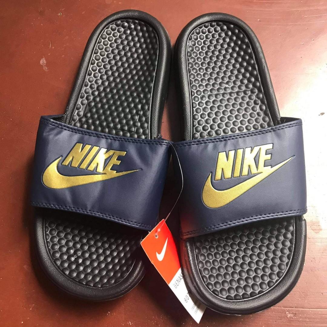 Nike slides blue and gold on sale