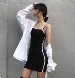 Black dress with white outline