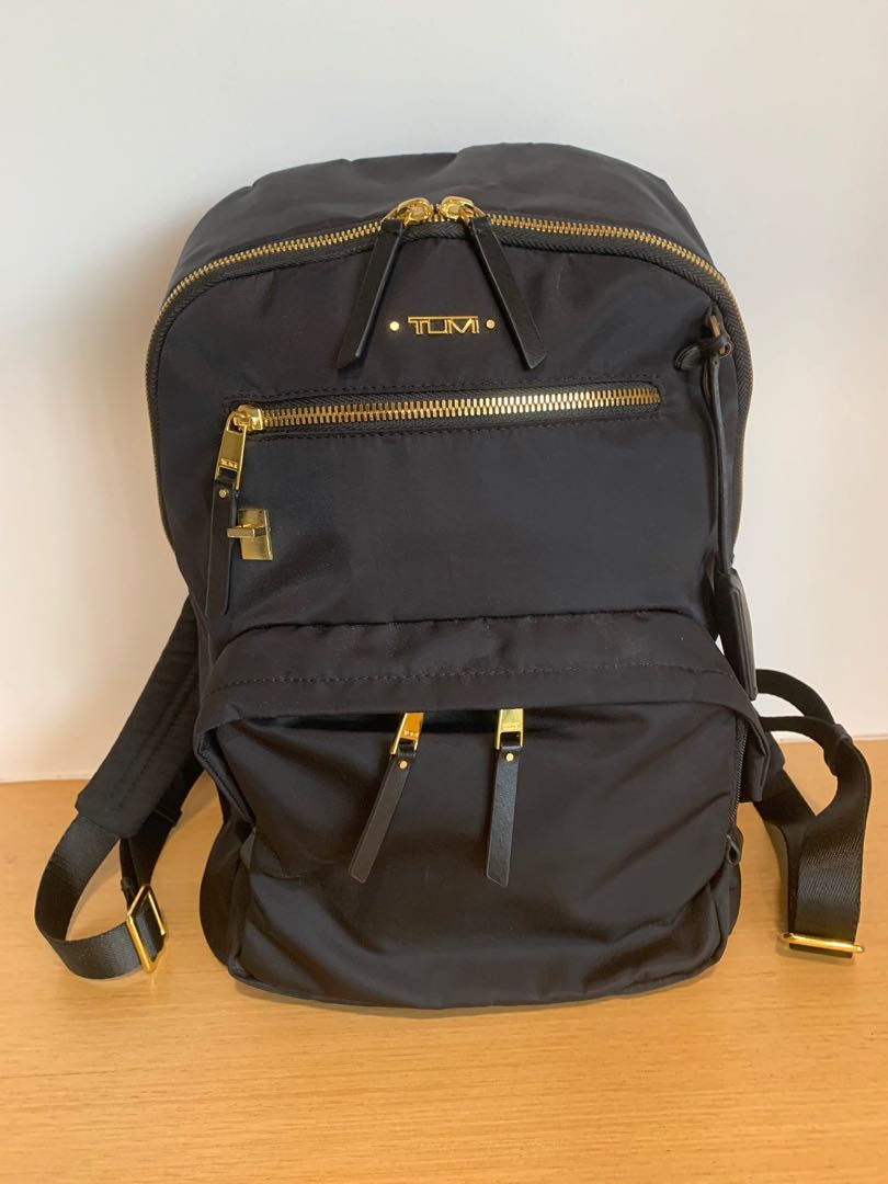 tumi backpack used