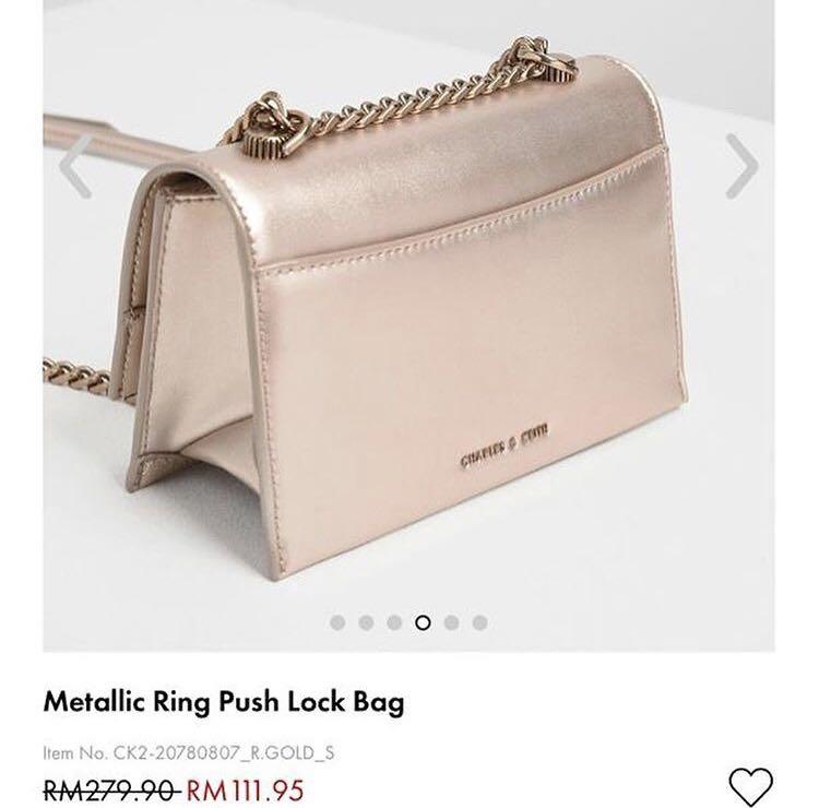Metallic ring push lock bag store