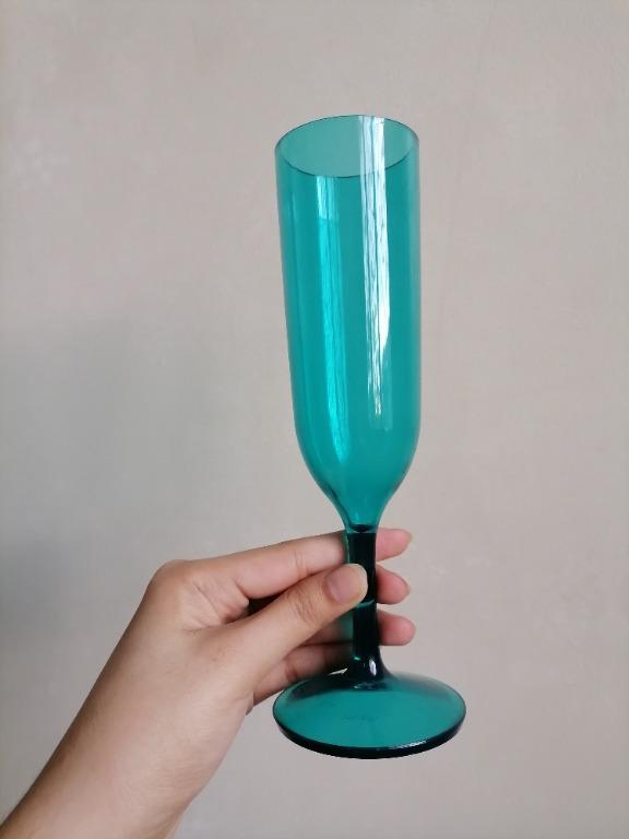 IKEA Teal Champagne Glass (Category: Other Kitchenware & Tableware) located in San Mateo. Submitted by Babyfume (Listing ID 1046762257, Image 2). Description: great quality BOUGHT IN THE US thick material (hard plastic, not easily broken when mishandled) has some weight to it, not cheap feeling no damage, stains or scratches suitable for ages 7 and above message for more details and pictures .