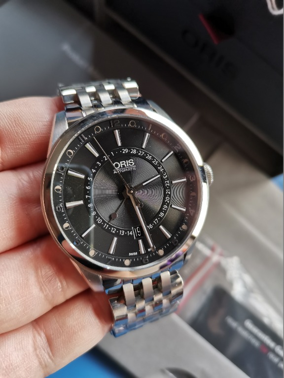 Oris artix pointer moon date top