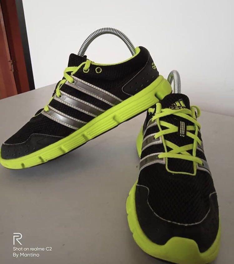 black and neon green adidas