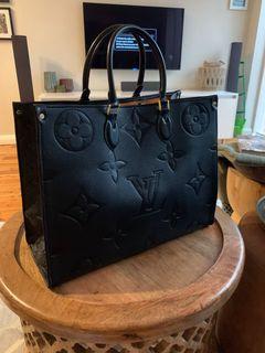 On the Go bag...100% Calfskin leather...See all pics