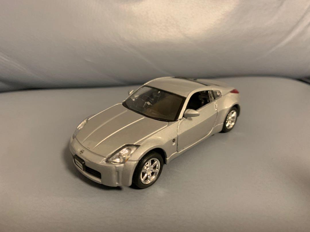 1 32 Nissan Fairlady Z33 銀色金屬玩具車可開門 玩具 遊戲類 玩具 Carousell