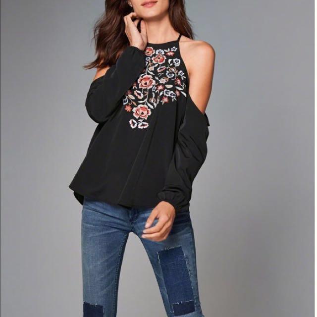 High neck store cold shoulder top