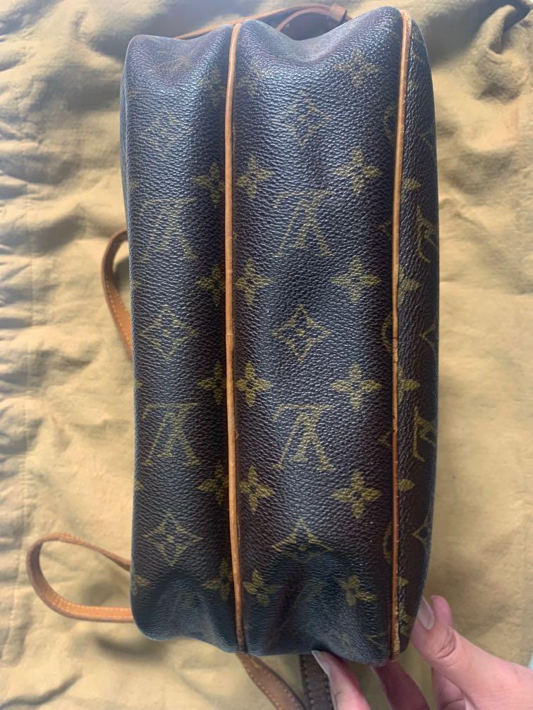 Pre loved authentic LOUIS VUITTON Monogram Reporter PM serial number  #SP0013 This messenger bag is crafted of iconic …