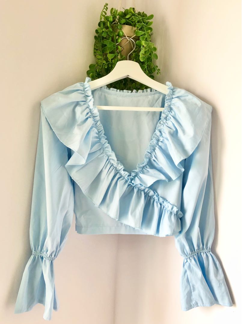 baby blue ruffle blouse