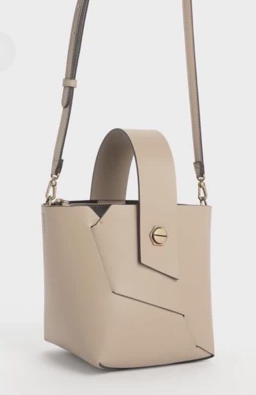 Charles and Keith Beige Wristlet Handle Bucket Bag Women s Fashion Bags Wallets Cross body Bags on Carousell