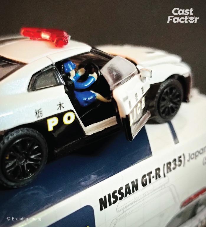 ERA CAR #35 1:64 Nissan GT-R (R35) Japan Police Car (comes with 1:64 Police  Woman Driver Figure)