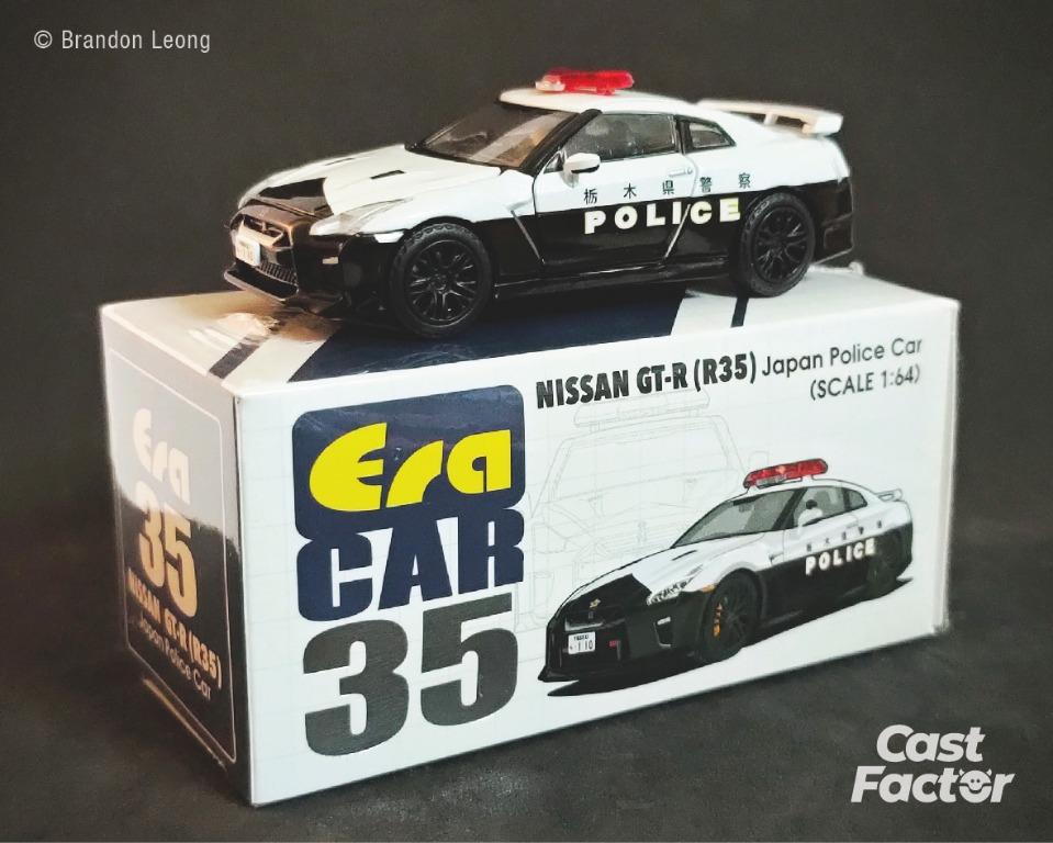 ERA CAR #35 1:64 Nissan GT-R (R35) Japan Police Car (comes with 1:64 Police  Woman Driver Figure)