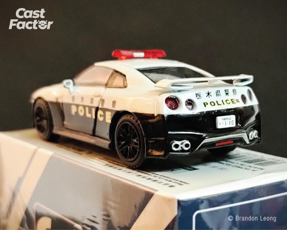 ERA CAR #35 1:64 Nissan GT-R (R35) Japan Police Car (comes with 1:64 Police  Woman Driver Figure)