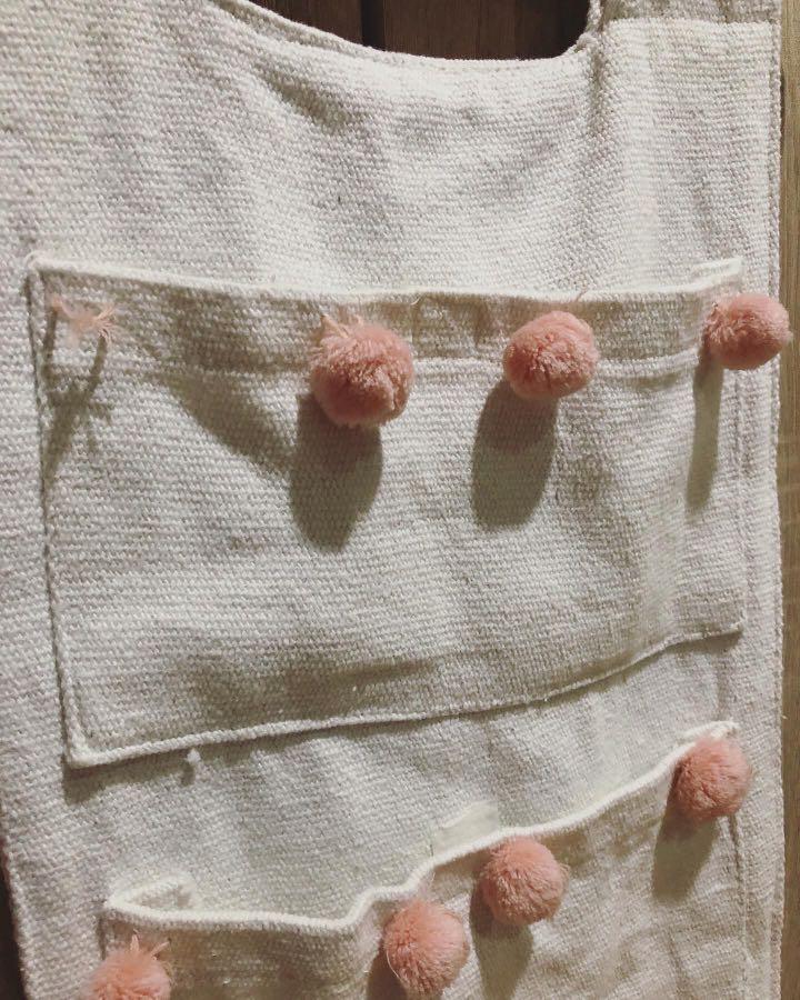 Hanging Fabric Organizer (Category: Changing Mats & Accessories) located in Las Pinas. Submitted by momma_on_a_hunt_ph (Listing ID 1047741341, Image 2). Description: Preloved, hanged buy hardly used 3 pockets with velcro Made of thick canvass Needs a little of repair on the pompom detail (not in photo: loose pompom kept inside pocket, not missing).