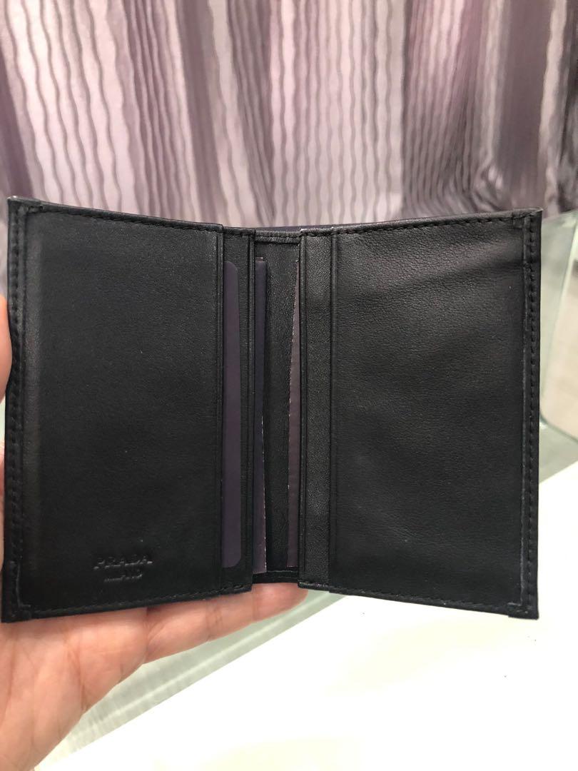 Prada Card Holder (Category: Accessories) located in Singapore. Submitted by gem08 (Listing ID 1047698012, Image 2). Description: Brand new kept unused with box and authencity card. Very spacious slot. Negotiable but no low ballers.