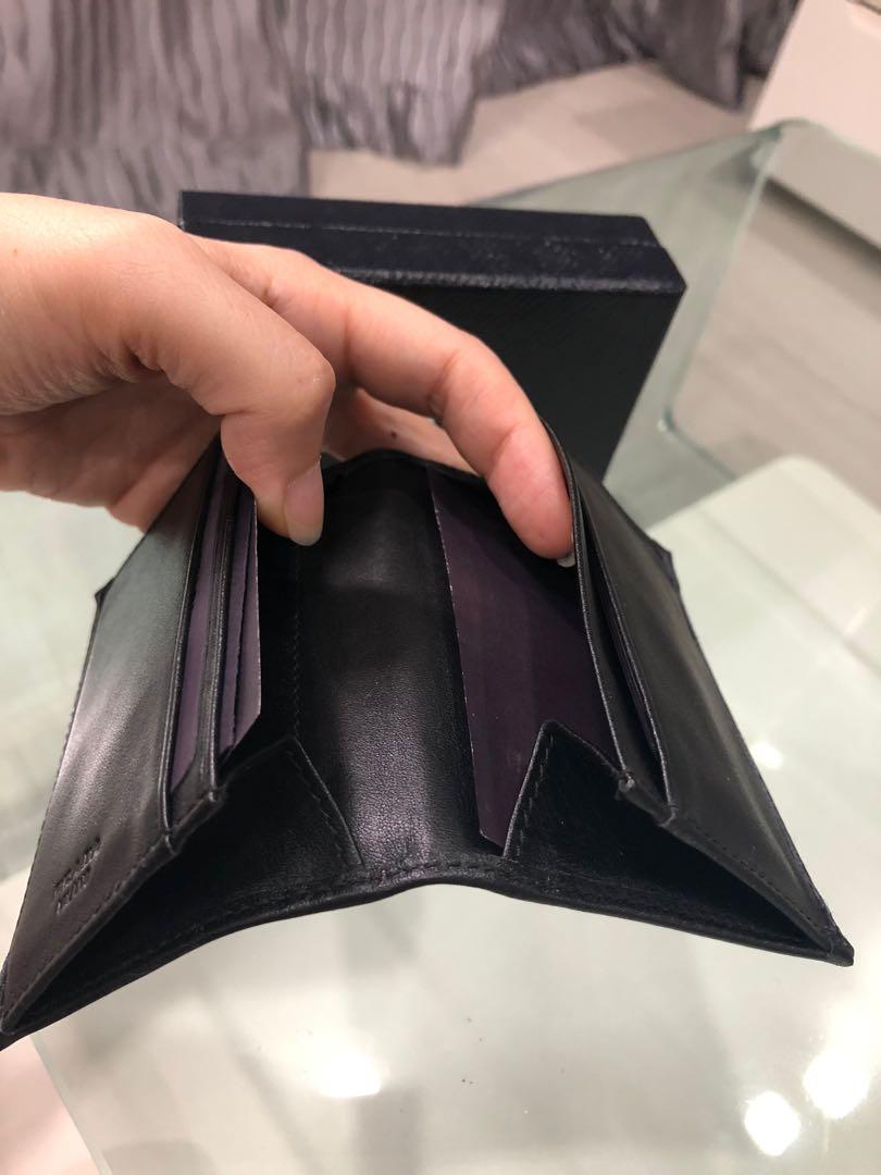 Prada Card Holder (Category: Accessories) located in Singapore. Submitted by gem08 (Listing ID 1047698012, Image 3). Description: Brand new kept unused with box and authencity card. Very spacious slot. Negotiable but no low ballers.