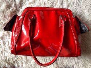 Red patent bag