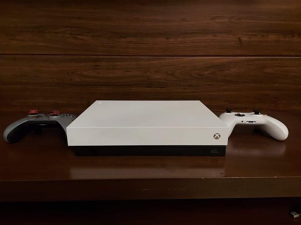 Xbox One X with Ultimate Game Pass (Category: Xbox) located in Quezon City. Submitted by jamesjasonjimenez761 (Listing ID 1047652427, Image 1). Description: Xbox One X with Xbox Game Pass Ultimate& EA Game pass (Valid until November 2021) - Save on online subscription fees - Comes with Original White Xbox One X Controller - Original HDMI Premiun Cable - Power Supply - Original packaging (box) Digital Games Included: 1. NBA 2K2O 2. Fight Night Cha