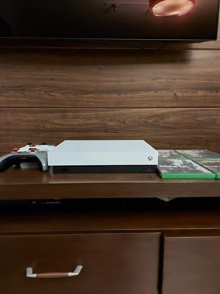 Xbox One X with Ultimate Game Pass (Category: Xbox) located in Quezon City. Submitted by jamesjasonjimenez761 (Listing ID 1047652427, Image 2). Description: Xbox One X with Xbox Game Pass Ultimate& EA Game pass (Valid until November 2021) - Save on online subscription fees - Comes with Original White Xbox One X Controller - Original HDMI Premiun Cable - Power Supply - Original packaging (box) Digital Games Included: 1. NBA 2K2O 2. Fight Night Cha