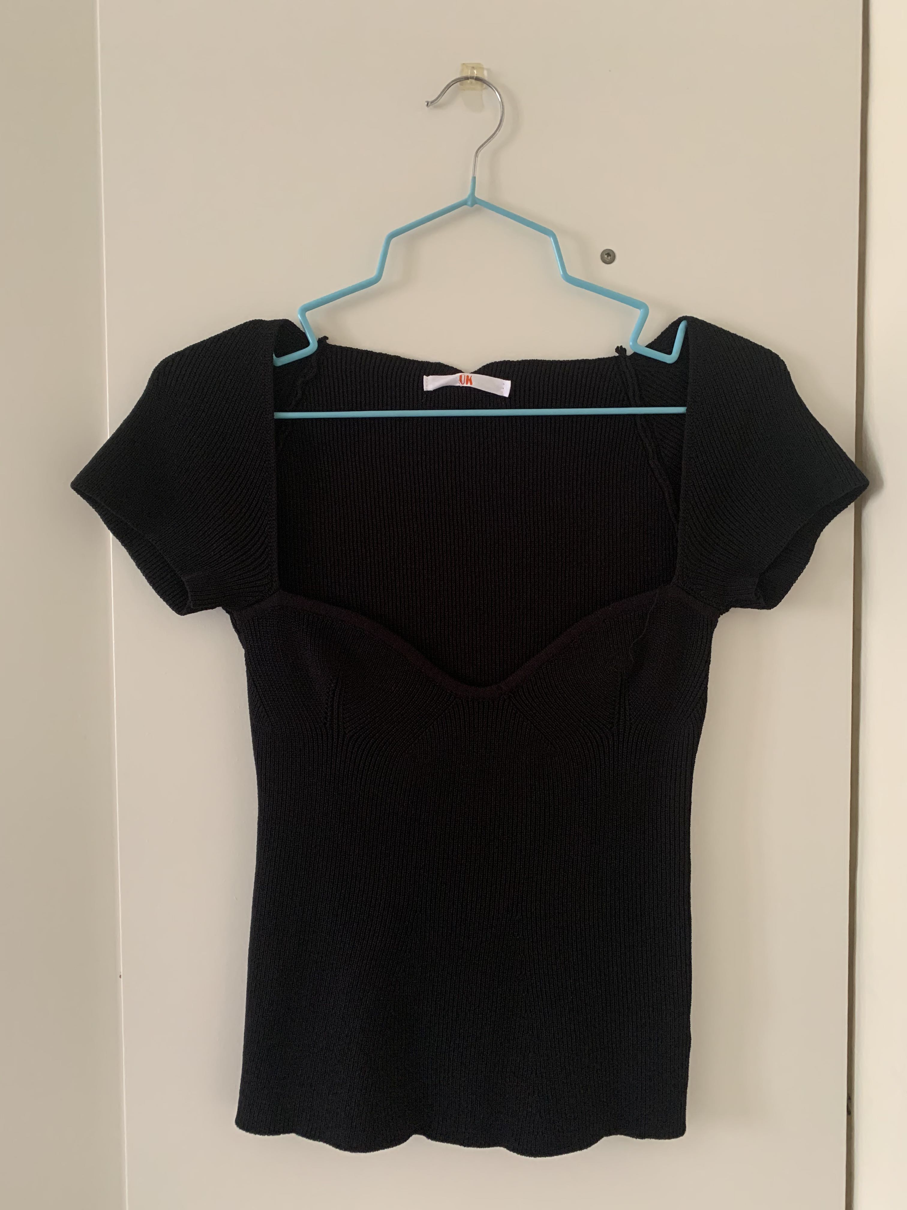 black plunging neckline top