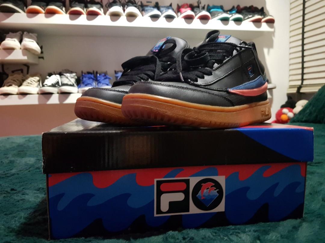 Pink dolphin fila shoes deals