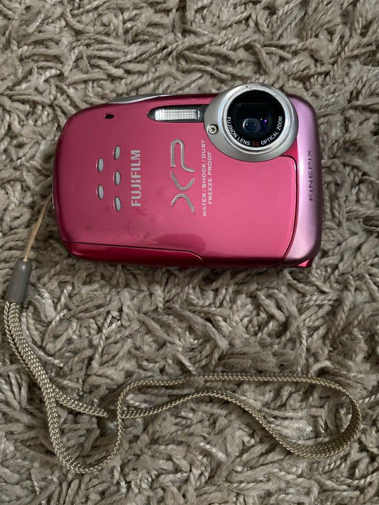 Fujifilm pink digital camera (Category: Voice Recorders) located in Manila. Submitted by foxydivas (Listing ID 1047904520, Image 1). Description: Water, shock, dust, freeze proof Pink Barely used.
