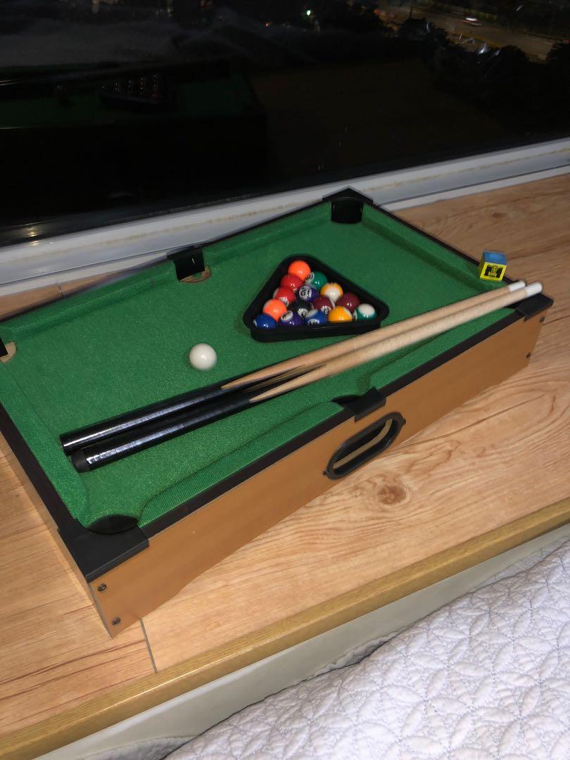 Mini Pool Table (Category: Other Kids Furniture) located in Singapore. Submitted by olijack (Listing ID 1047968662, Image 2). Description: Great condition miniature pool table. Full set. Hardly used. Looking for a quick deal!.
