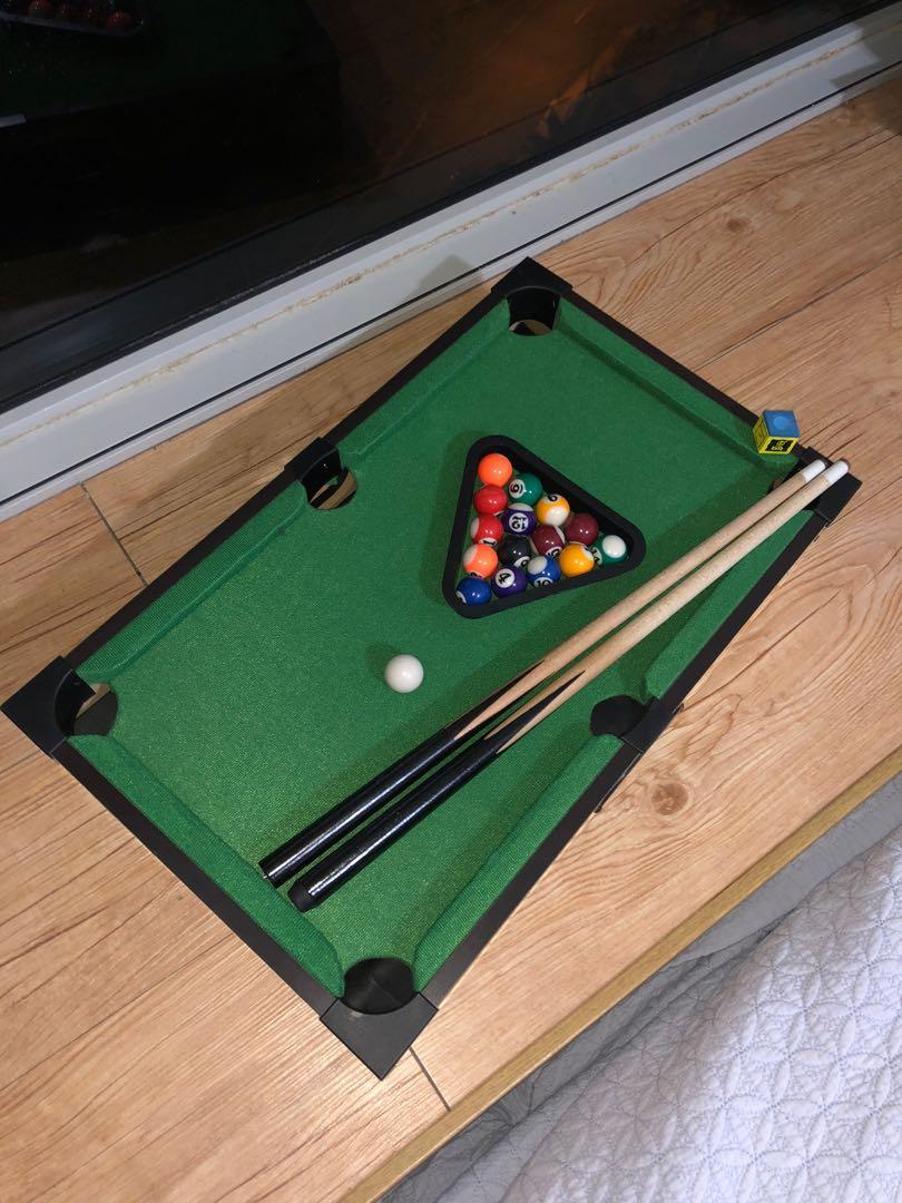 Mini Pool Table (Category: Other Kids Furniture) located in Singapore. Submitted by olijack (Listing ID 1047968662, Image 1). Description: Great condition miniature pool table. Full set. Hardly used. Looking for a quick deal!.