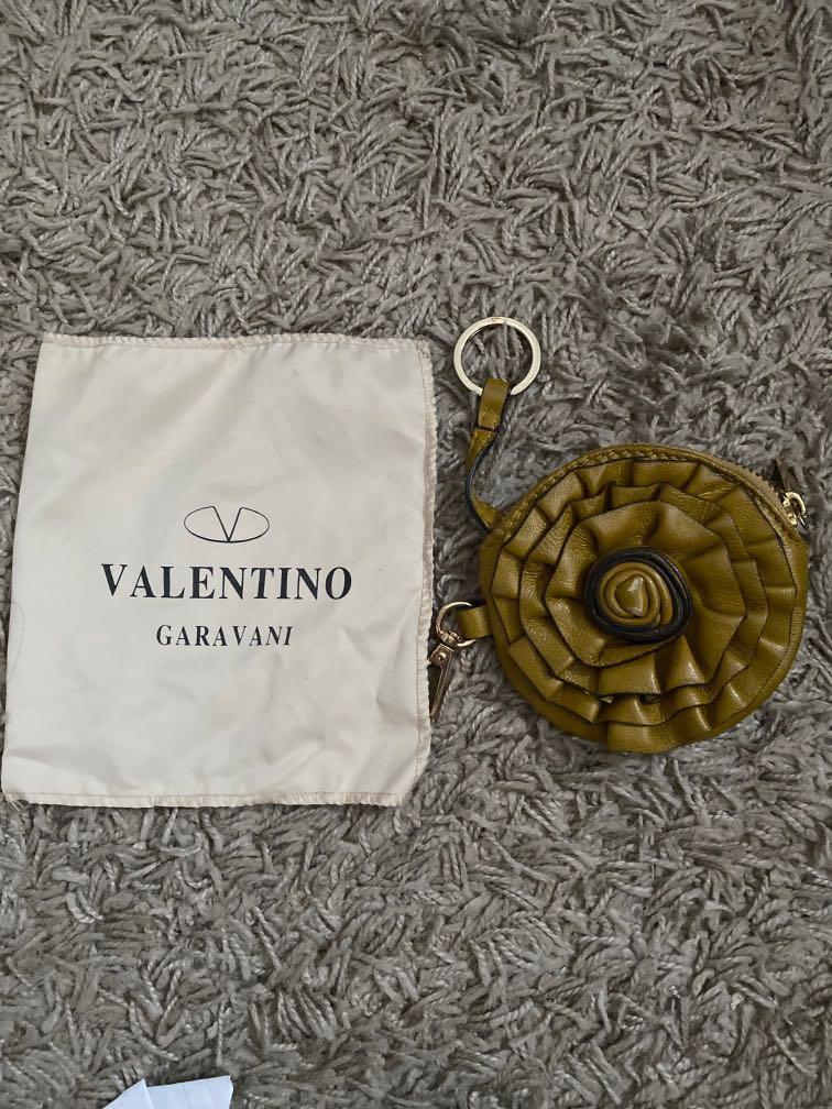 Valentino leather wallet authentic (Category: Luxury Bags & Wallets) located in Manila. Submitted by foxydivas (Listing ID 1047905428, Image 1). Description: Pure leather wallet Green Authentic valentino Good as new Only used once With pouch.