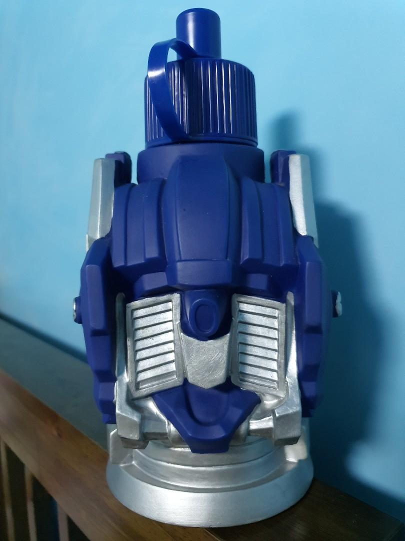 https://media.karousell.com/media/photos/products/2020/12/1/transformer_optimus_prime_drin_1606840403_aa0adde8_progressive.jpg