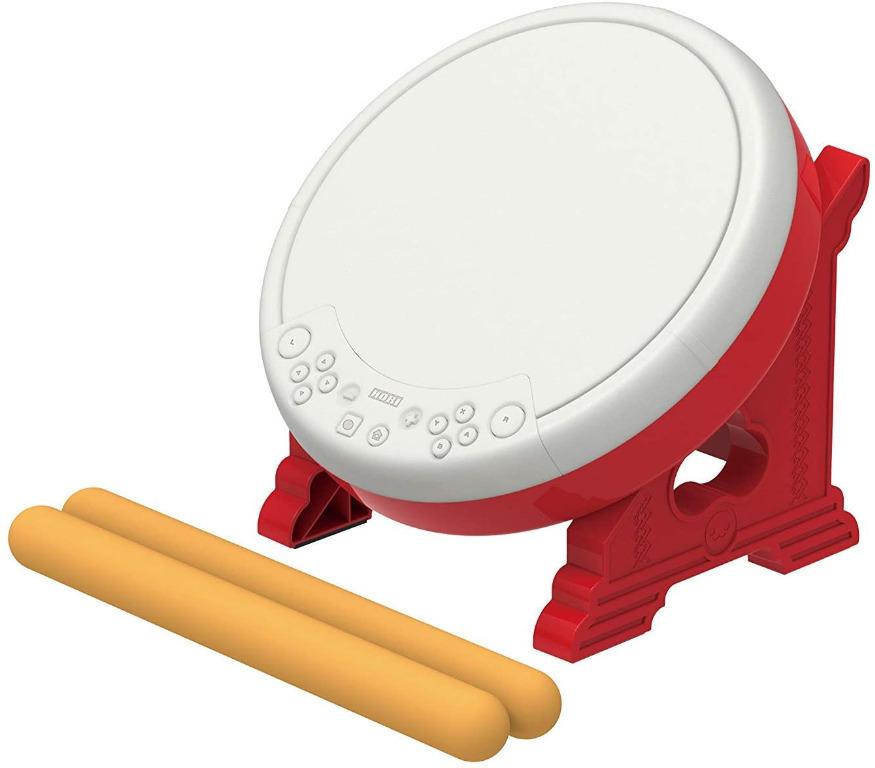 Taiko Drum Controller (Category: Controllers) located in Singapore. Submitted by game_sale (Listing ID 1055093302, Image 3). Description: Taiko expert controller appeared for Nintendo Switch. It is the most suitable drum type controller for the Nintendo Switch and game software. Equipped with an operation button on the drum body, operation within the game of Taiko no Tatsujin is also possible. Two exclusive drumsticks are attached, approximately 