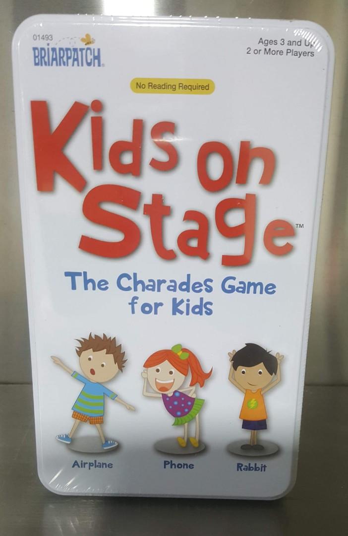 Charades Kids On Stage In Tin 