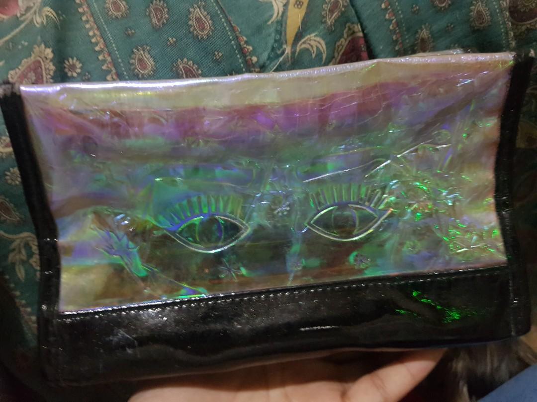 BENEFIT hologram makeup bag (Category: Makeup) located in Manila. Submitted by stellasonlinegaragesale (Listing ID 1055165941, Image 2). Description: .