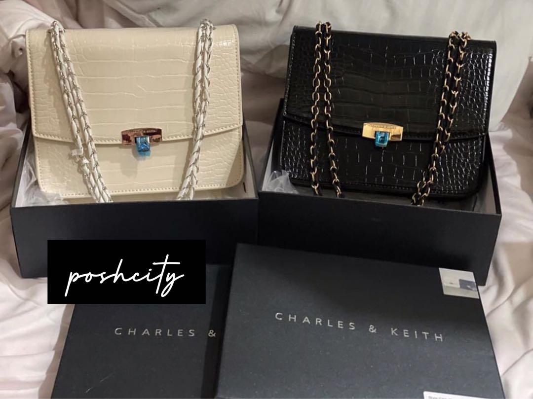 Charles and Keith Croc Pushlock Convertible Chain Bag (Category: Luxury Bags & Wallets) located in Taguig. Submitted by poshcity (Listing ID 1055286791, Image 1). Description: ✨PLEASE MAKE READING A HABIT✨ Facebook page: @poshcity Stated down below all the details and informations about the item. Shop at your own risk. BAGS ARE ALL ON HAND 💕 👜: Charles and Keith Croc Pushlock Convertible Chain Bag ✨: With Box, Tag and Serial Number ✨: Black and