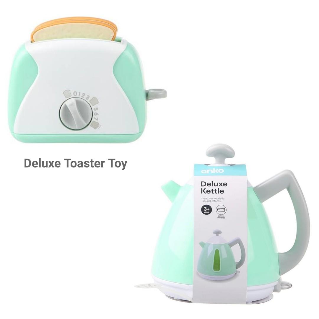 Toy kettle and toaster with sounds outlet