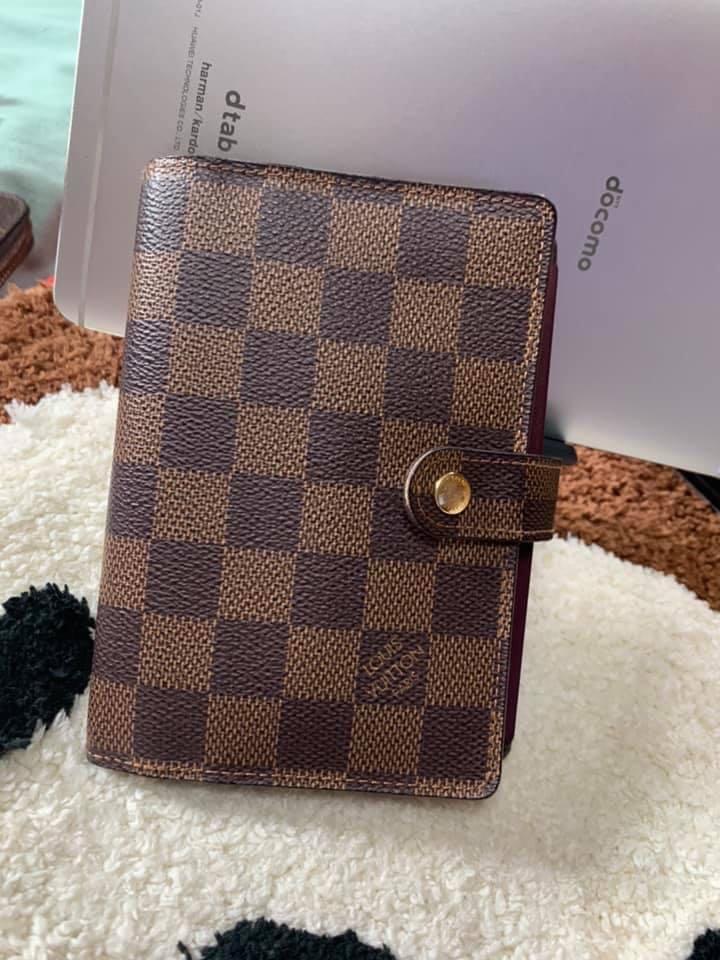 Lv Passport holder Authentic (Category: Luxury Bags & Wallets) located in Pasay City. Submitted by lizshoppe (Listing ID 1055348499, Image 1). Description: Preloved Passport Holder Excellent Condition With initials 100% Authentic.