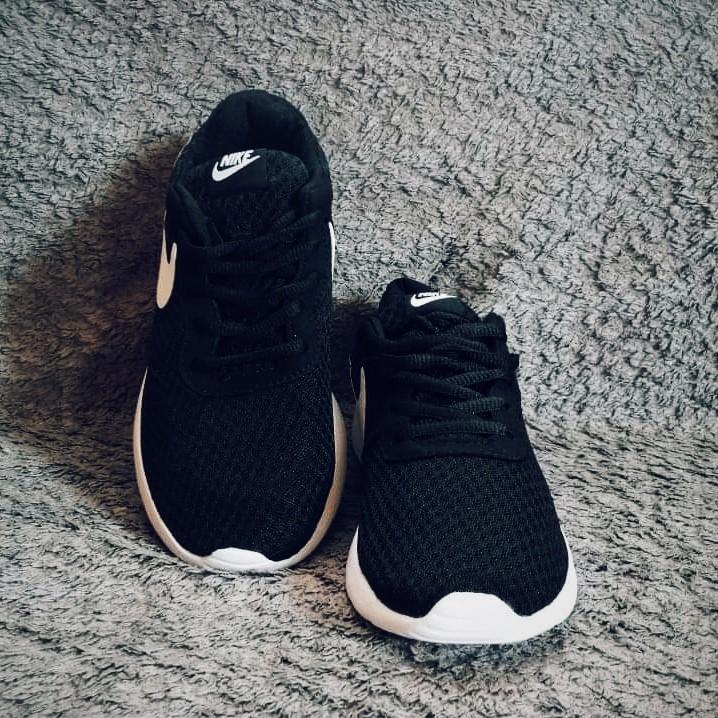 nike tanjun 27.5