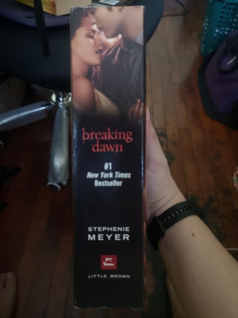 The twilight Saga breaking dawn by Stephenie Meyer (Category: Storybooks) located in Pasig City. Submitted by aggalang2sg (Listing ID 1055229101, Image 2). Description: buyer shoulders sf with poster inside movie cover big book.